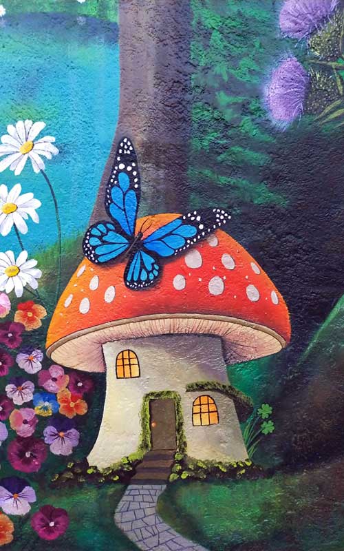 butterfly on mushroom house